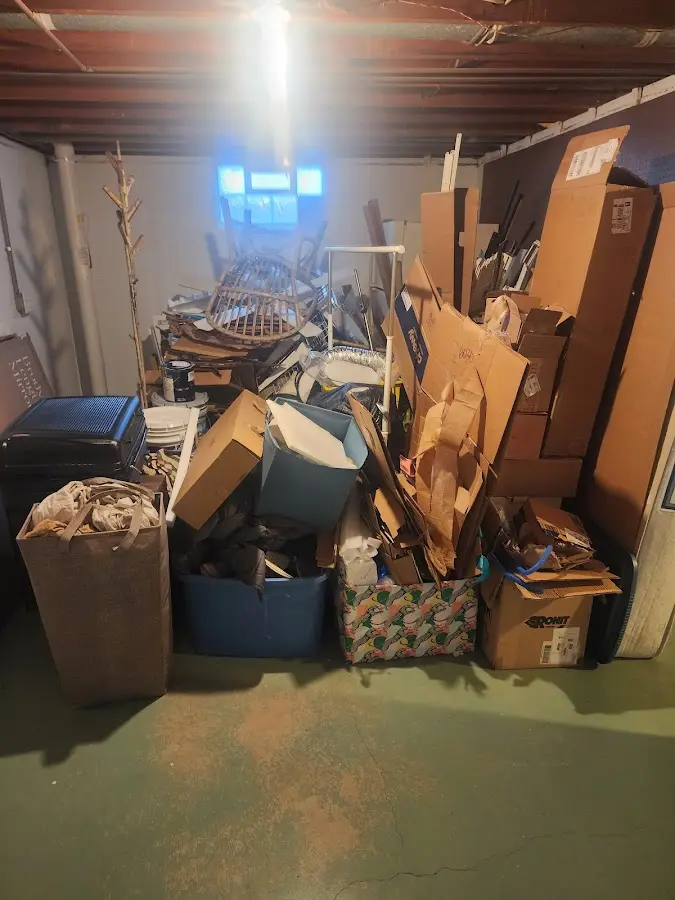 Roll-off dumpster container at job site for 4 Yard Dumpster Rental in Marshalltown